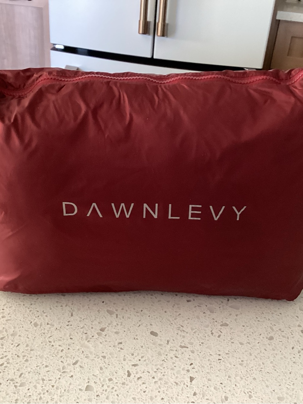 Dawn Levy Red packable coat with pouch.